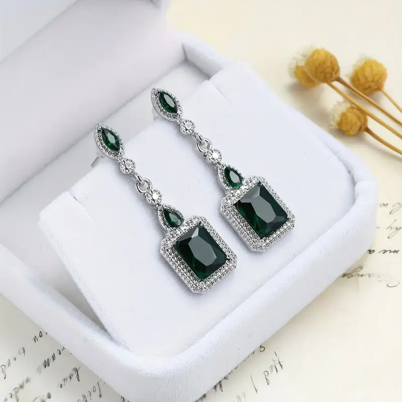 Clarion White Gold Emerald Earrings